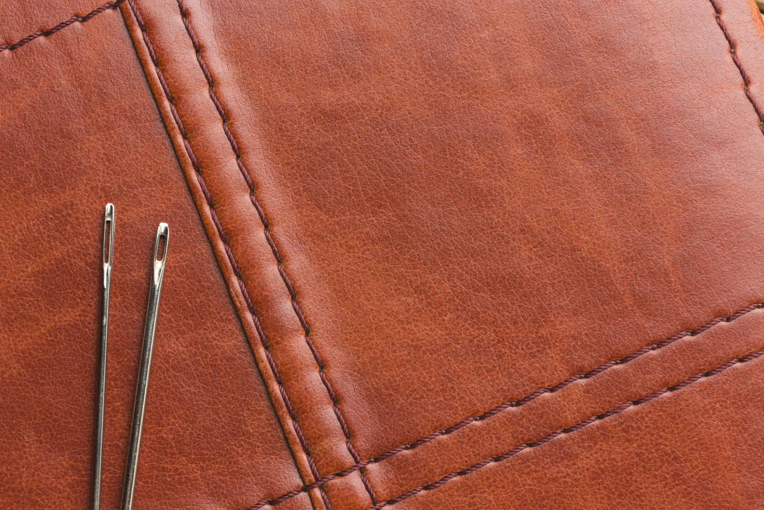 top-view-leather-with-needles-copy-space